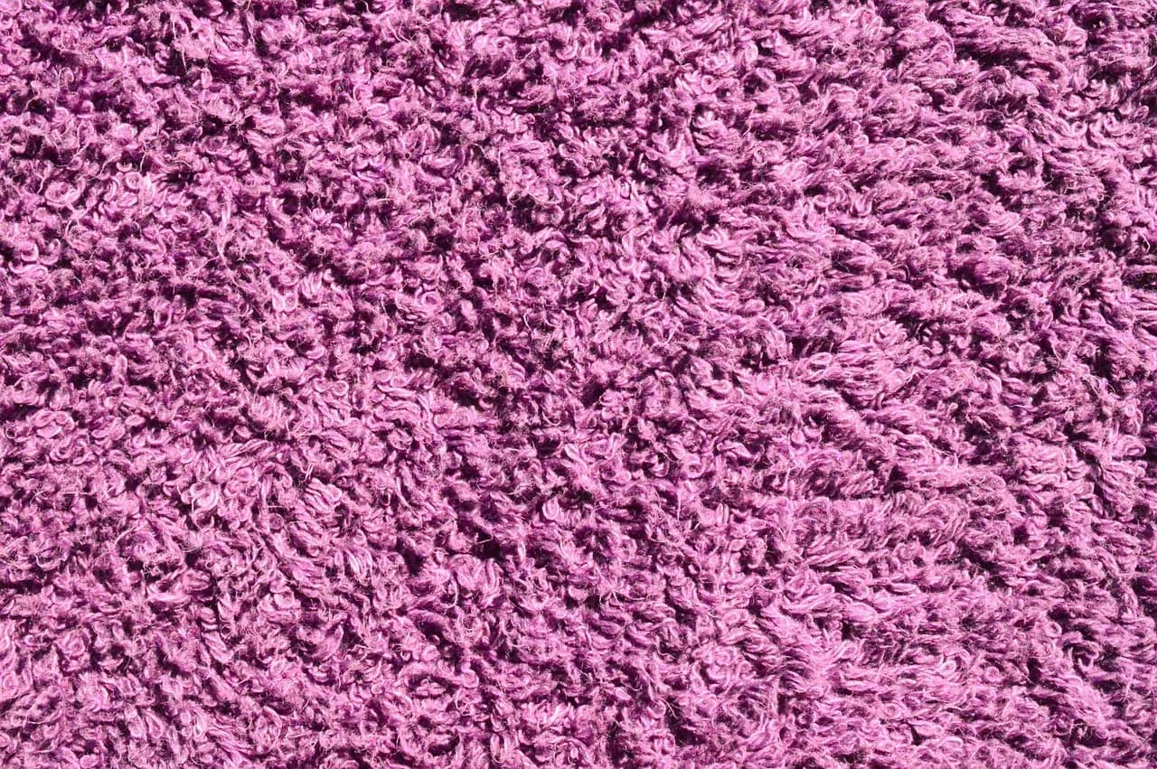 Close-up of a pink textured fabric surface