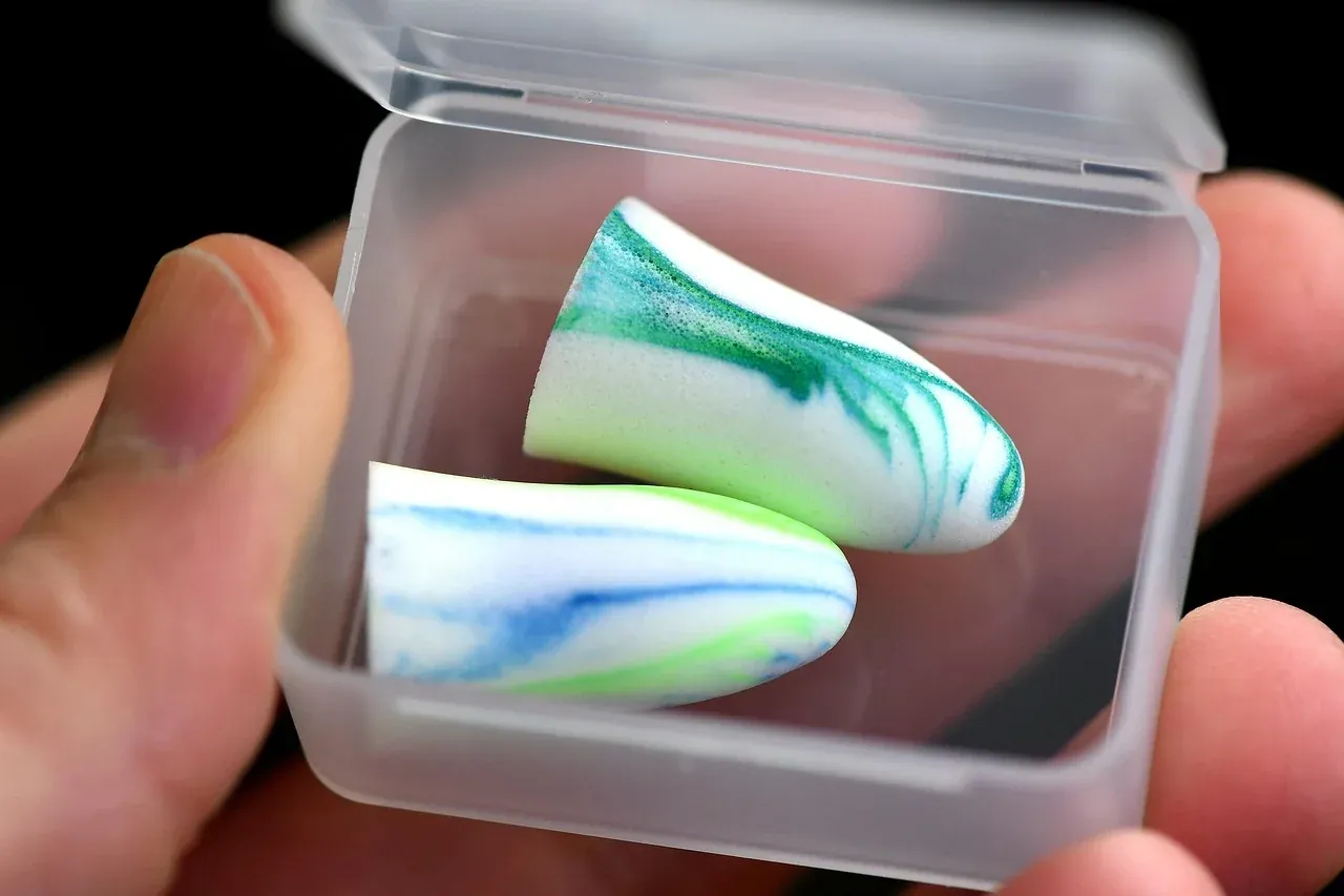 Foam earplugs in a small clear storage case