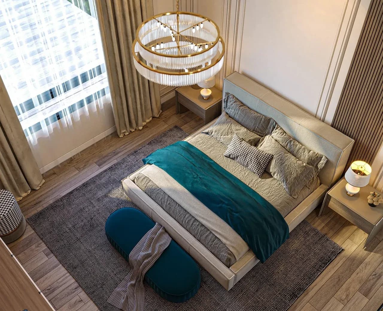 Bed with blue accents beneath a large window