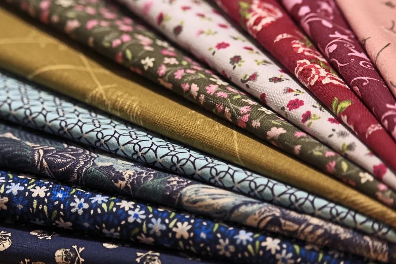 Folded fabrics in a range of patterns and colours