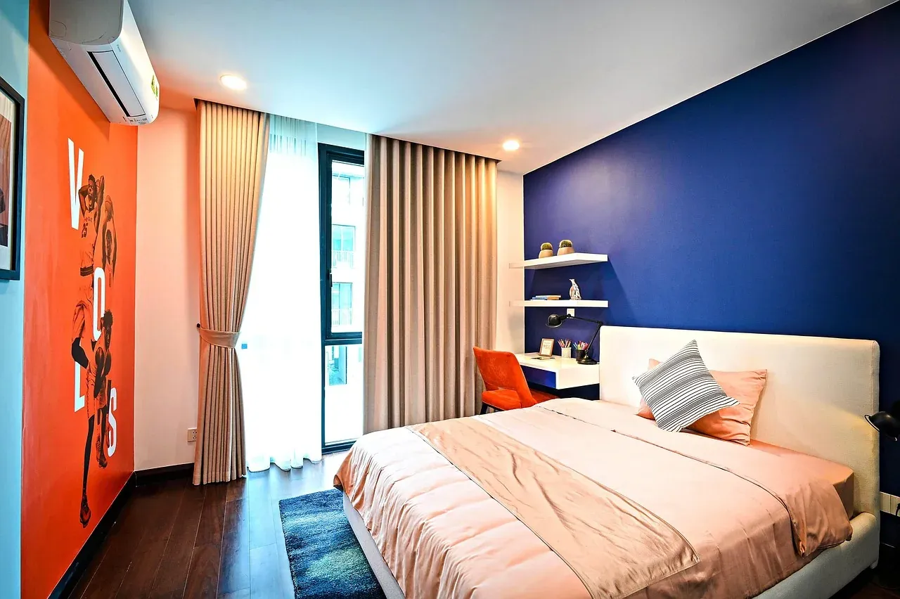 Twin beds in a colourful guest room
