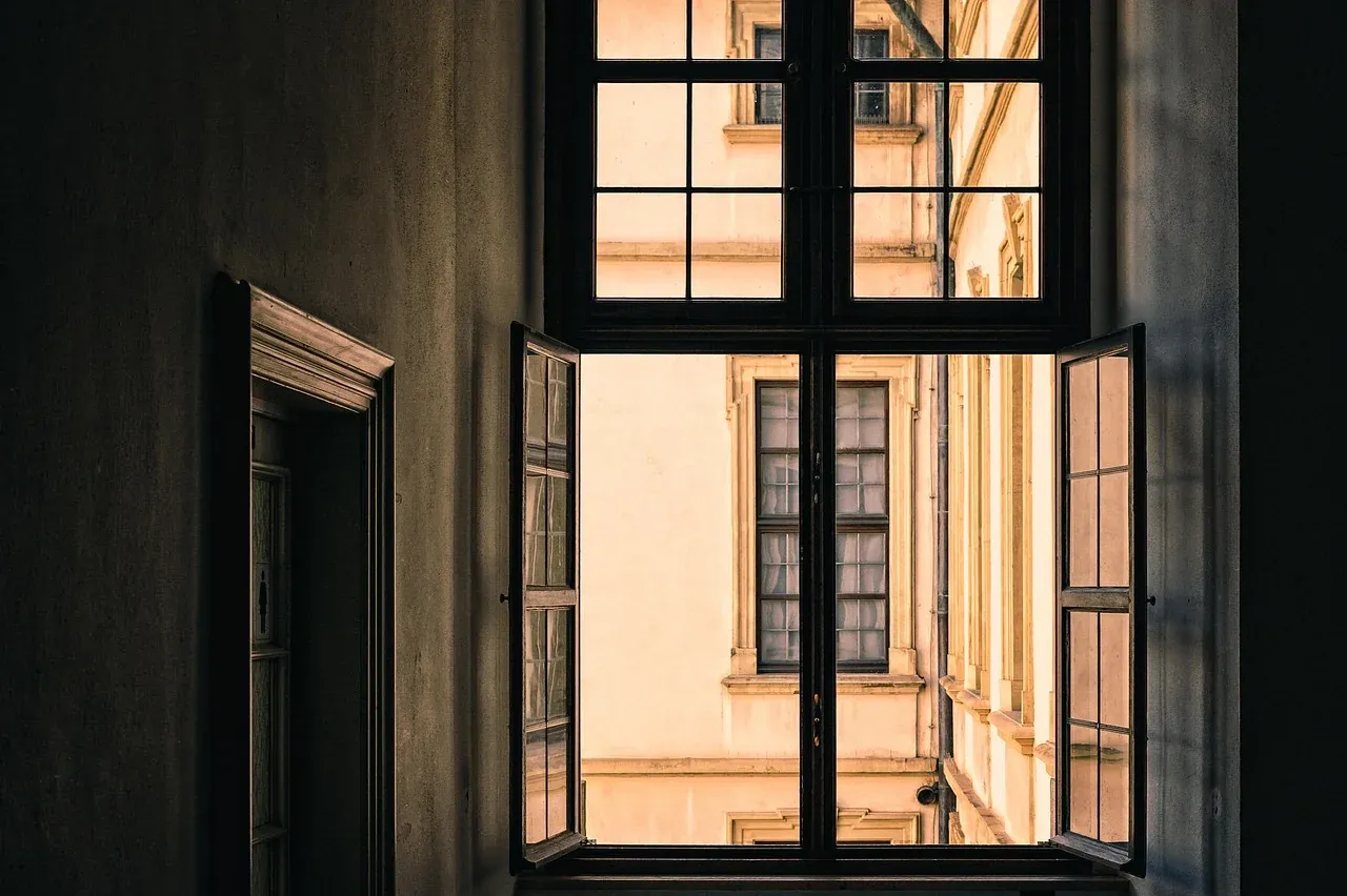 Open window in a dimly lit room